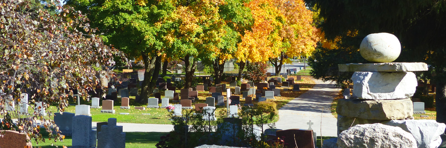 Inukshuk in cemetery grounds